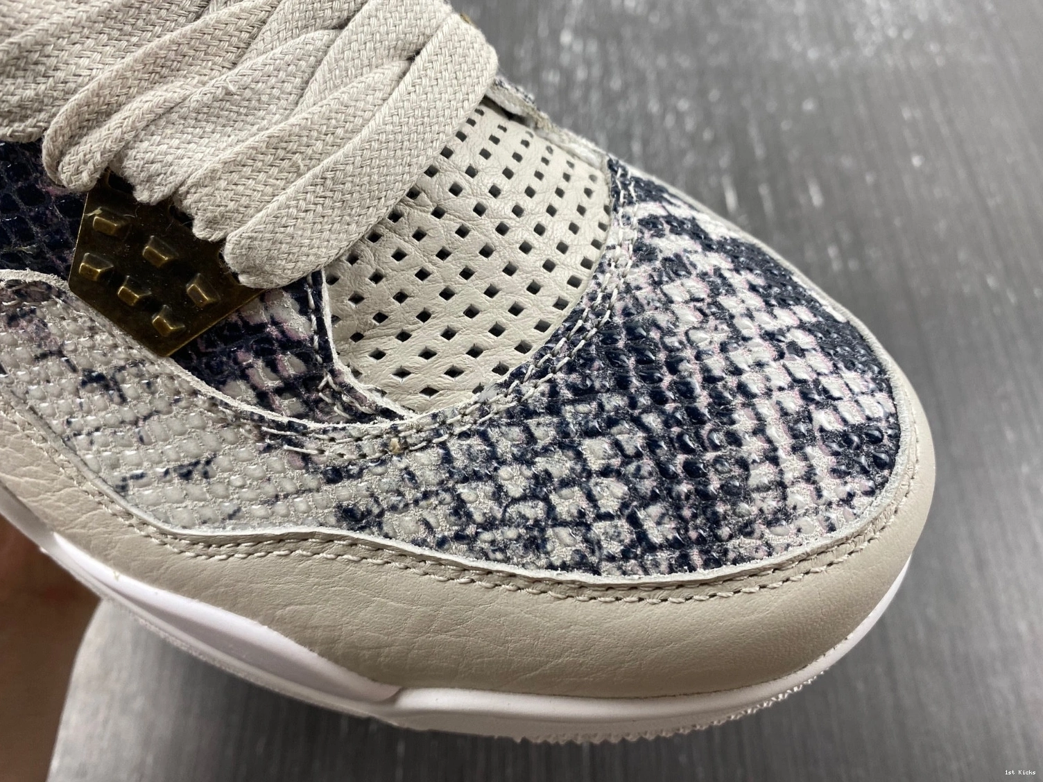 - 819139-030 Retro Snakeskin Jordan 4 1225